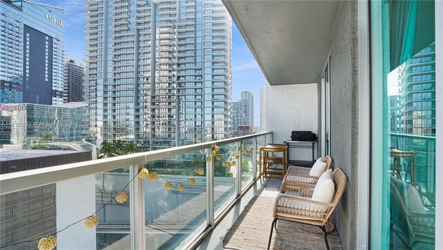 balcony featuring a city view