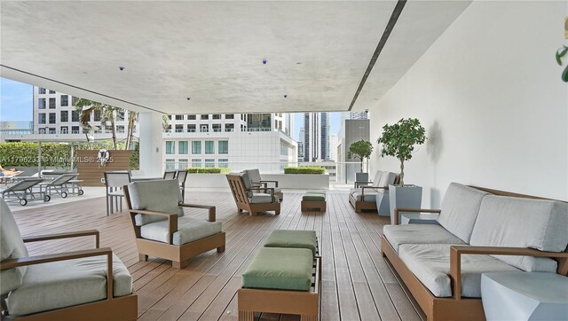 55 SE 6th St Unit 1804, Miami, FL 33131 - wooden terrace with outdoor lounge area and a view of city