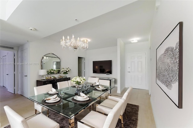 2425 SW 27th Ave Unit 1408, Miami, FL 33145 - dining space featuring a chandelier