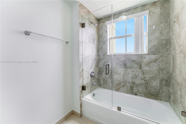 2425 SW 27th Ave Unit 1408, Miami, FL 33145 - bathroom featuring baseboards and enclosed tub / shower combo