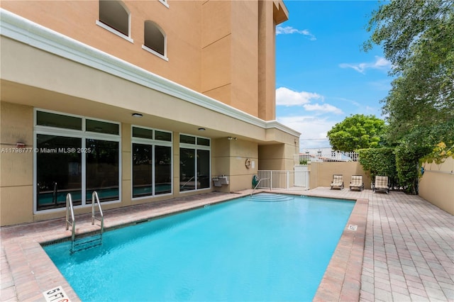 2425 SW 27th Ave Unit 1408, Miami, FL 33145 - community pool featuring fence and a patio