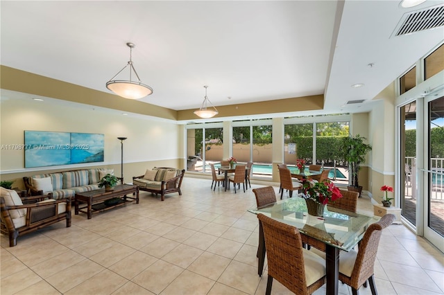 2425 SW 27th Ave Unit 1408, Miami, FL 33145 - dining space with light tile patterned floors