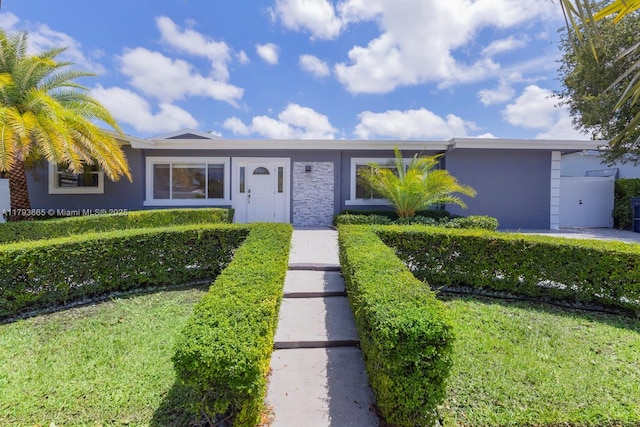 11210 SW 181st St, Miami, FL 33157 - view of front of home featuring stucco siding and stone siding