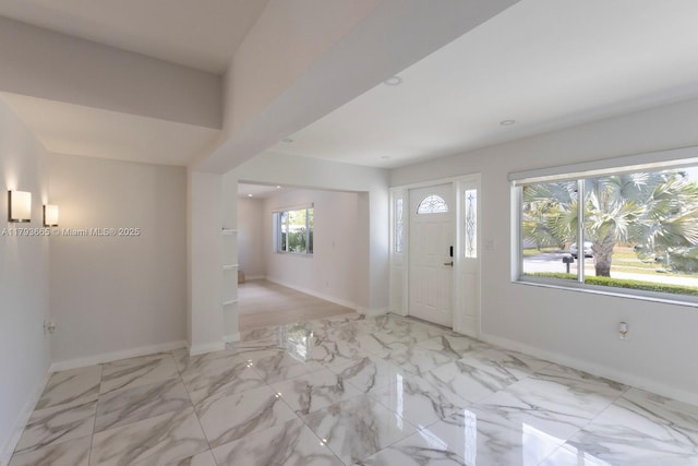 11210 SW 181st St, Miami, FL 33157 - foyer featuring baseboards, light marble finish floors, and recessed lighting