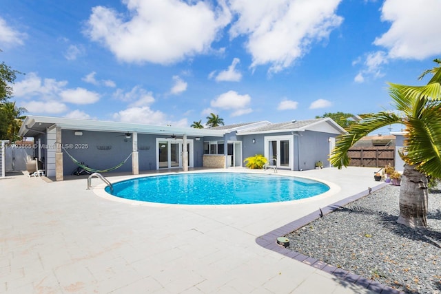 11210 SW 181st St, Miami, FL 33157 - view of pool featuring a ceiling fan, a patio, french doors, and fence