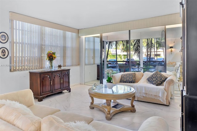 living room featuring light marble finish floors