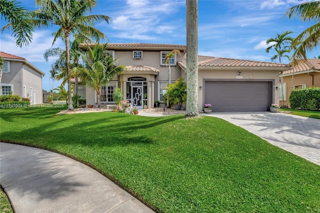 12672 Tucano Cir, Boca Raton, FL 33428 - mediterranean / spanish home featuring decorative driveway, stucco siding, a tile roof, a front yard, and a garage