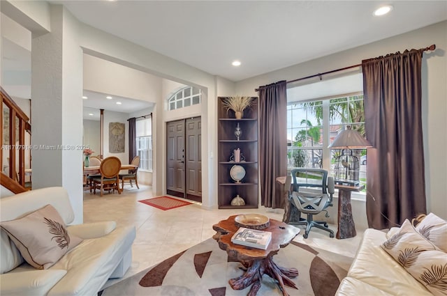 12672 Tucano Cir, Boca Raton, FL 33428 - tiled living area with recessed lighting and stairway