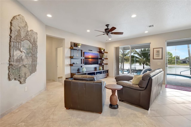 12672 Tucano Cir, Boca Raton, FL 33428 - living room with a ceiling fan, recessed lighting, and light tile patterned floors