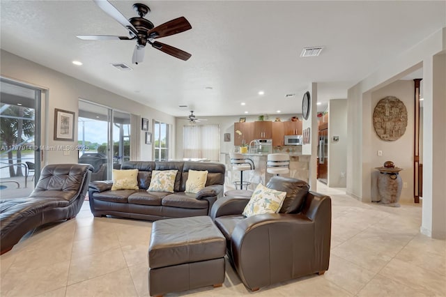 12672 Tucano Cir, Boca Raton, FL 33428 - living area with a ceiling fan, light tile patterned floors, and recessed lighting