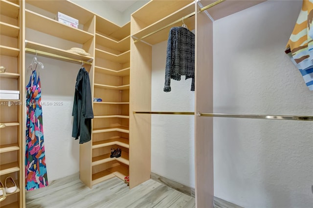 12672 Tucano Cir, Boca Raton, FL 33428 - spacious closet featuring wood finished floors