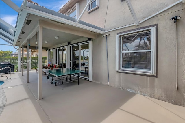 12672 Tucano Cir, Boca Raton, FL 33428 - view of patio / terrace featuring glass enclosure and a grill