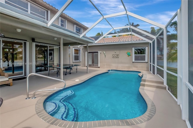 12672 Tucano Cir, Boca Raton, FL 33428 - swimming pool with a patio area and glass enclosure