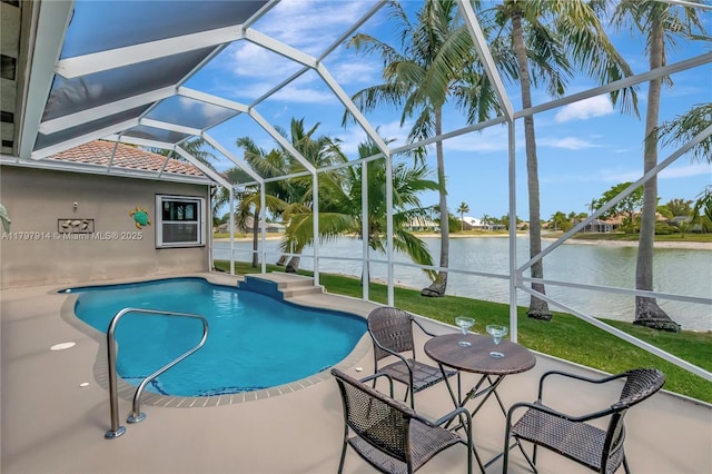 12672 Tucano Cir, Boca Raton, FL 33428 - swimming pool with a patio, a water view, a lawn, and glass enclosure