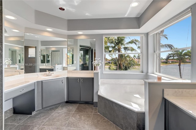 12672 Tucano Cir, Boca Raton, FL 33428 - bathroom with vanity, a bath, and recessed lighting