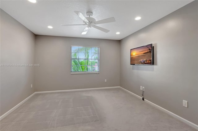 12672 Tucano Cir, Boca Raton, FL 33428 - unfurnished room featuring light carpet, baseboards, recessed lighting, and a ceiling fan