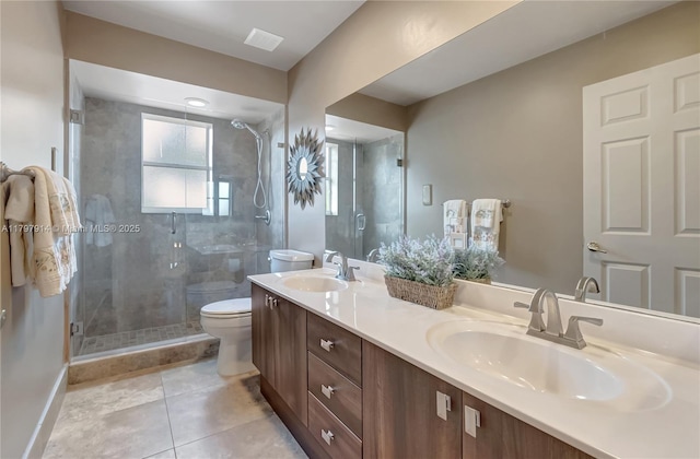 12672 Tucano Cir, Boca Raton, FL 33428 - bathroom featuring toilet, double vanity, a shower stall, and baseboards