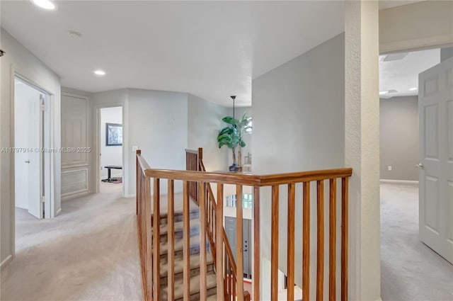 12672 Tucano Cir, Boca Raton, FL 33428 - hallway featuring an upstairs landing, light carpet, recessed lighting, and baseboards