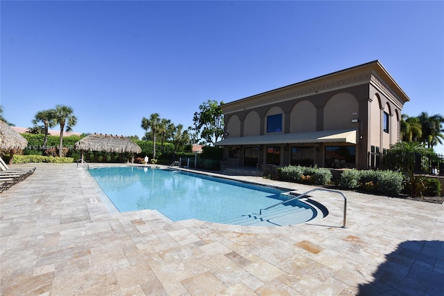 12672 Tucano Cir, Boca Raton, FL 33428 - community pool with a patio area and fence
