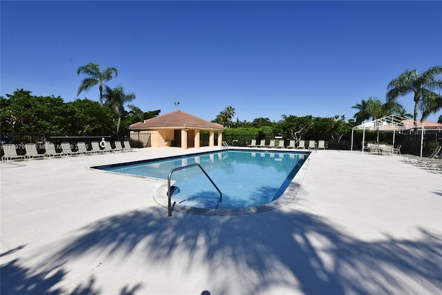 12672 Tucano Cir, Boca Raton, FL 33428 - community pool featuring fence and a patio area