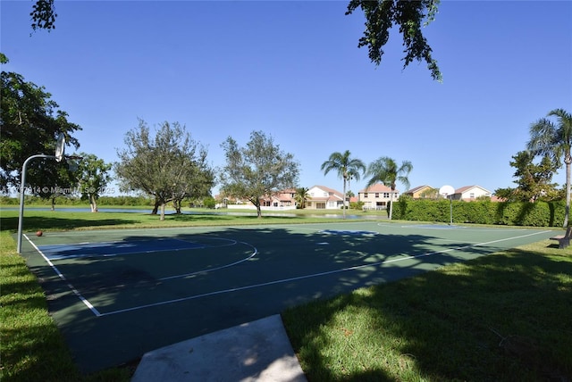 12672 Tucano Cir, Boca Raton, FL 33428 - view of sport court with community basketball court, a lawn, and a residential view