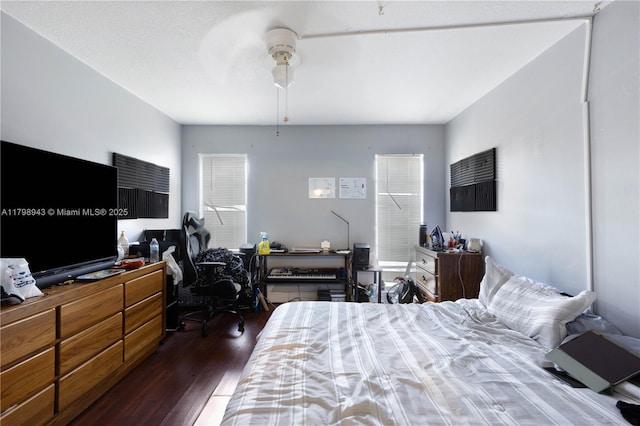 4848 NW 24th Ct Unit 215, Lauderdale Lakes, FL 33313 - bedroom featuring wood finished floors and a ceiling fan
