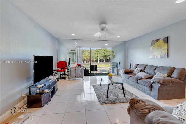 4848 NW 24th Ct Unit 215, Lauderdale Lakes, FL 33313 - tiled living area featuring a ceiling fan and recessed lighting