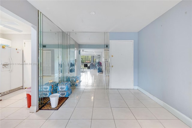 4848 NW 24th Ct Unit 215, Lauderdale Lakes, FL 33313 - corridor featuring light tile patterned flooring
