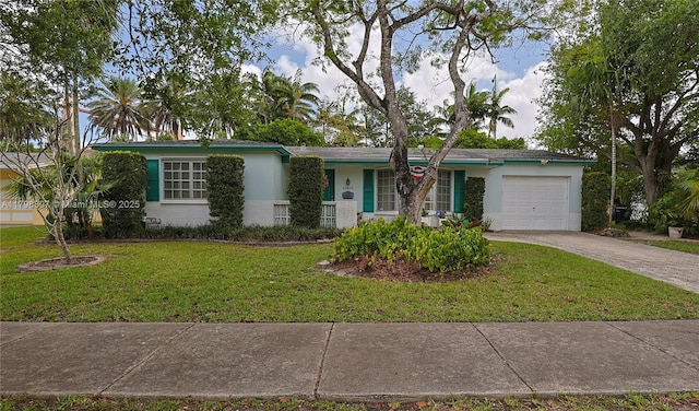 10610 SW 103rd St, Miami, FL 33176 - single story home with a garage, driveway, a front lawn, brick siding, and stucco siding