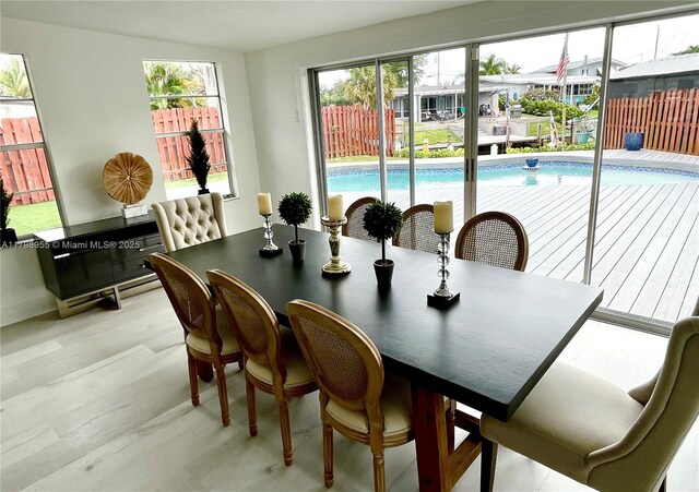2406 Marathon Ln, Fort Lauderdale, FL 33312 - dining room with light wood-style floors