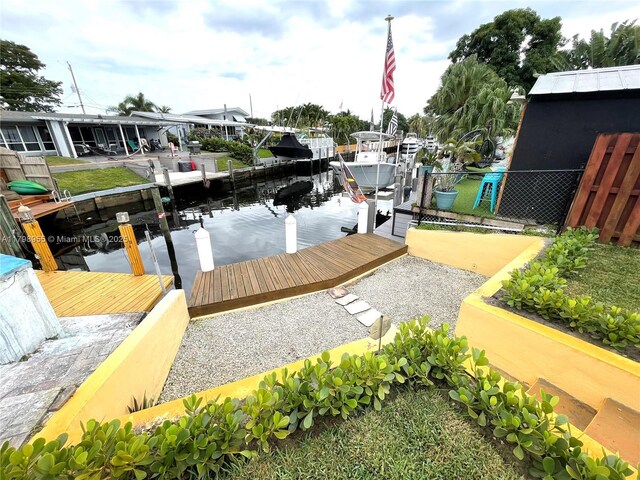 2406 Marathon Ln, Fort Lauderdale, FL 33312 - dock featuring boat lift