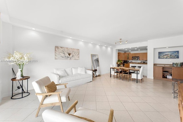 151 Crandon Blvd Unit 926, Key Biscayne, FL 33149 - living room featuring light tile patterned floors, recessed lighting, and rail lighting