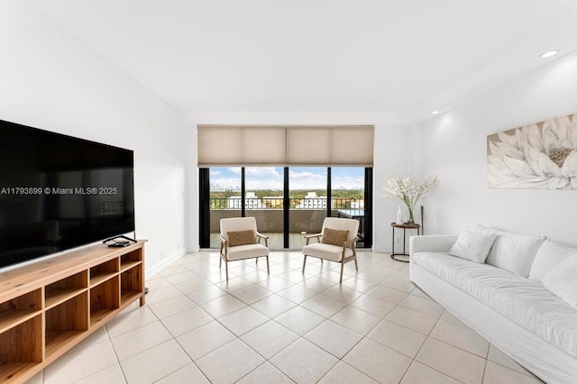 151 Crandon Blvd Unit 926, Key Biscayne, FL 33149 - living room featuring light tile patterned floors and recessed lighting