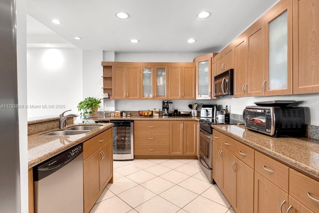 151 Crandon Blvd Unit 926, Key Biscayne, FL 33149 - kitchen with stainless steel appliances, a sink, wine cooler, open shelves, and light stone countertops