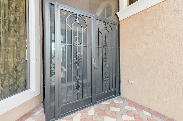 8100 Muirhead Cir, Boynton Beach, FL 33472 - property entrance with stucco siding