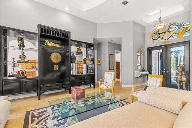 8100 Muirhead Cir, Boynton Beach, FL 33472 - living room with a high ceiling, tile patterned floors, recessed lighting, and french doors