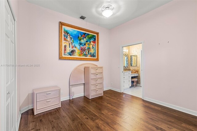 8100 Muirhead Cir, Boynton Beach, FL 33472 - unfurnished bedroom with wood finished floors and ensuite bathroom