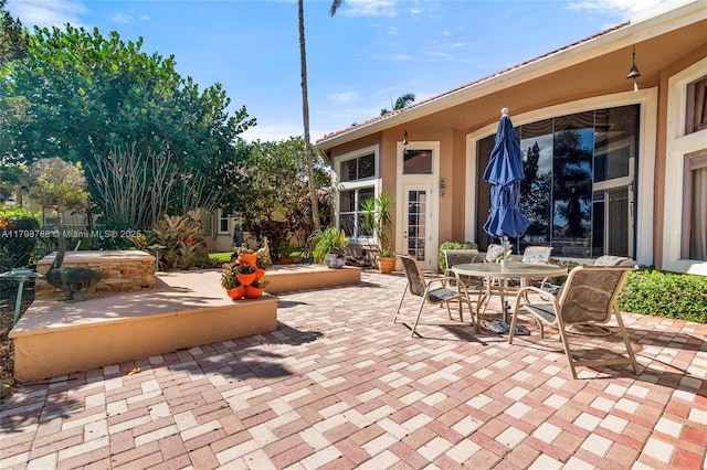 8100 Muirhead Cir, Boynton Beach, FL 33472 - view of patio featuring outdoor dining area