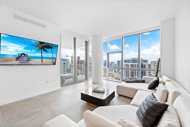 851 NE 1st Ave Unit 4011, Miami, FL 33132 - living area with a wall of windows and a city view