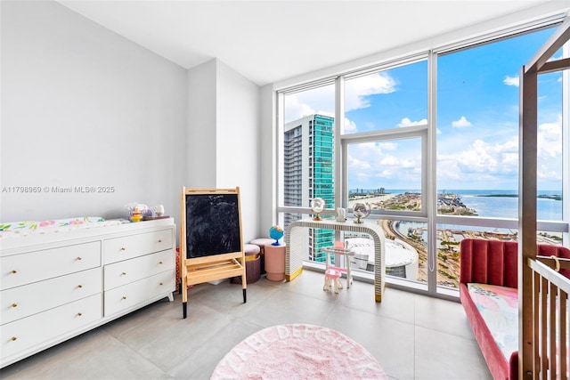 851 NE 1st Ave Unit 4011, Miami, FL 33132 - bedroom with a wall of windows and a water view