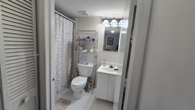 6425 SW 130th Pl Unit 704, Miami, FL 33183 - bathroom featuring tile patterned flooring, vanity, and toilet