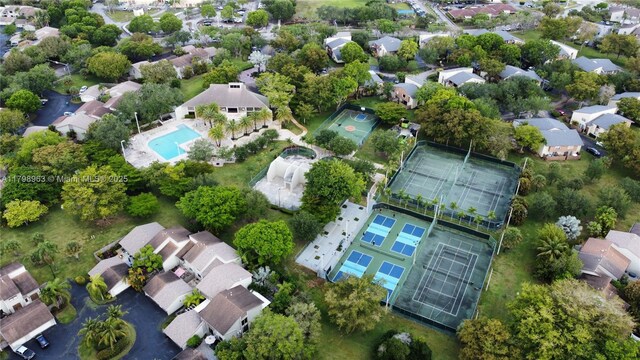 view of property location featuring nearby suburban area and a pool