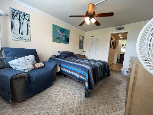9420 Sunrise Lakes Blvd Unit 106, Sunrise, FL 33322 - bedroom with crown molding, ceiling fan, and a closet