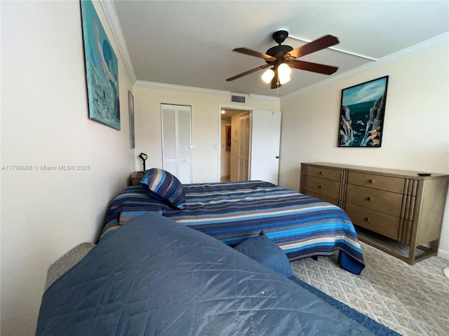 9420 Sunrise Lakes Blvd Unit 106, Sunrise, FL 33322 - bedroom with crown molding, carpet flooring, a closet, and a ceiling fan