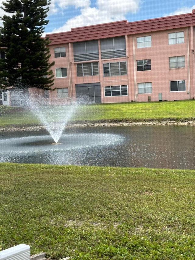 9420 Sunrise Lakes Blvd Unit 106, Sunrise, FL 33322 - view of property featuring a water view