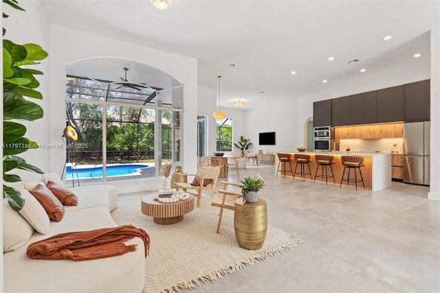 10275 Oak Meadow Ln, Lake Worth, FL 33449 - living area with recessed lighting and a sunroom