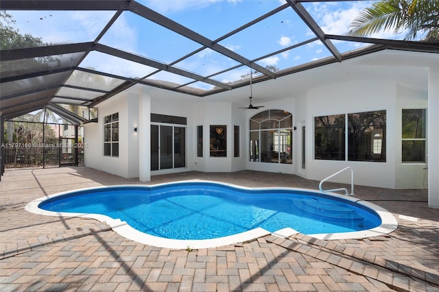 10275 Oak Meadow Ln, Lake Worth, FL 33449 - outdoor pool with a patio, ceiling fan, and a lanai