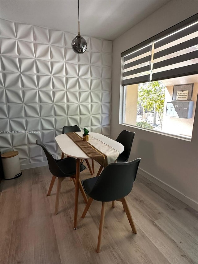 2624 NE 30th Pl Unit 101B, Fort Lauderdale, FL 33306 - dining room with wood finished floors and baseboards