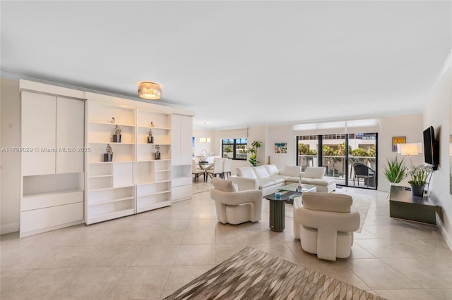 9801 Collins Ave Unit 5S, Bal Harbour, FL 33154 - living room with light tile patterned flooring, crown molding, and baseboards
