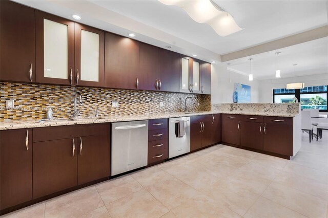 9801 Collins Ave Unit 5S, Bal Harbour, FL 33154 - kitchen featuring dishwasher, a sink, a peninsula, backsplash, and recessed lighting